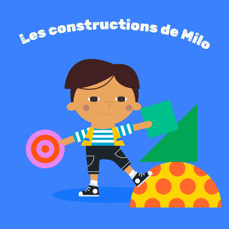 Un garçon tient des formes découpées